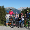 Family with mountain bikes in Berwang